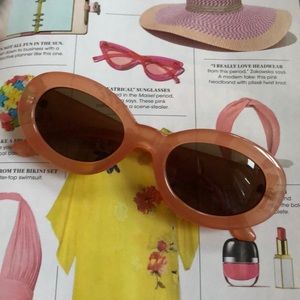 Tan rimmed sunglasses